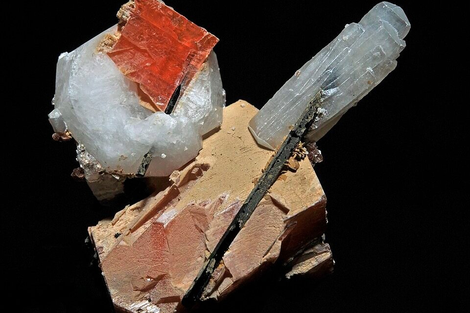  What are the key differences between carbonate and silicate ores in terms of extraction and processing?